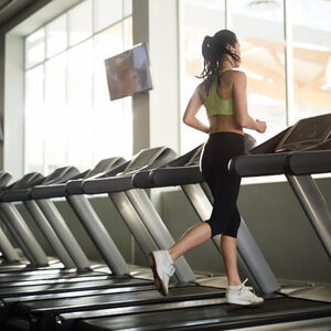 young-woman-running-treadmill